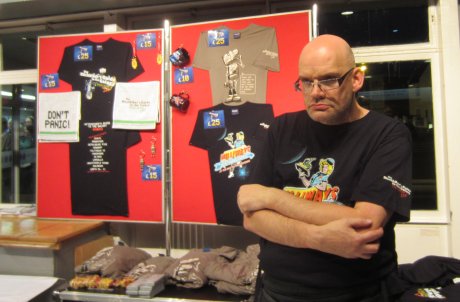 Merchandising Marvin selling Don't Panic souvenirs